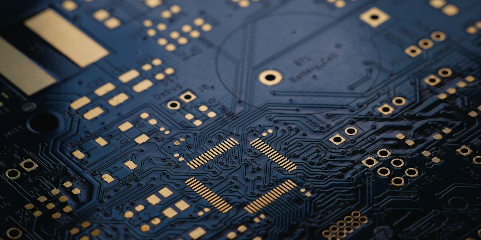 Macro view of a printed circuit board with gold traces