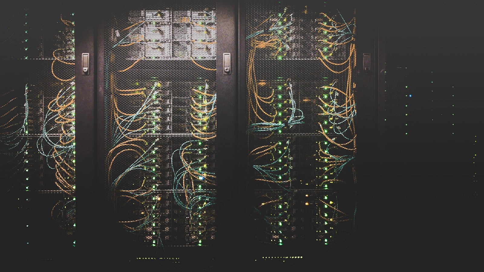 Server racks with network cabling in a data center